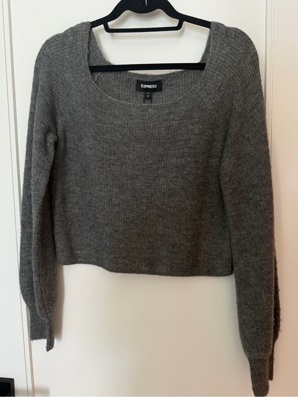 Cropped long sleeve sweater